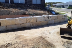46 Sandstone block retaining wall construction in Wyong